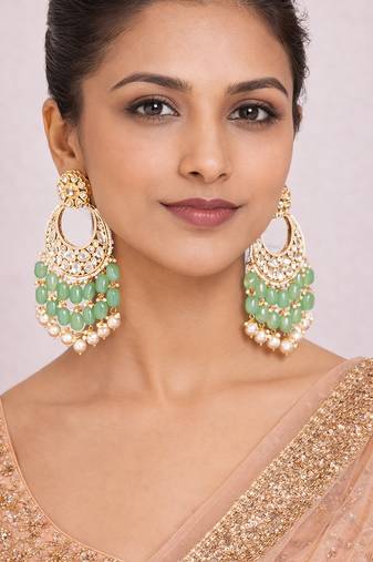 Gold plated green kundan earrings