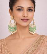 Gold plated green kundan earrings