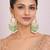 Gold plated green kundan earrings