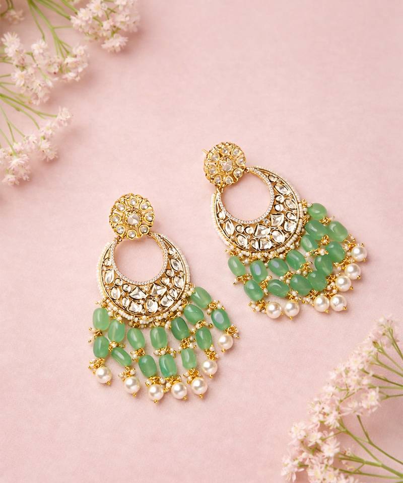 Gold plated green kundan earrings
