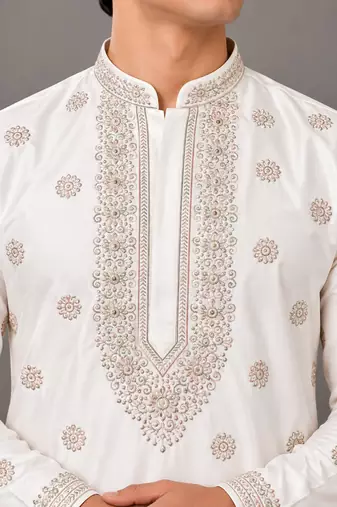 Royal ivory kurta set with all-over motifs