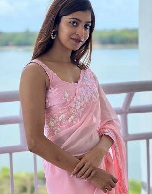 pink pink ethnic motifs sequinned poly georgette saree 4