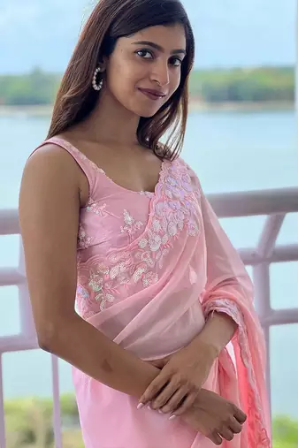 pink pink ethnic motifs sequinned poly georgette saree