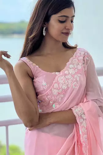 pink pink ethnic motifs sequinned poly georgette saree