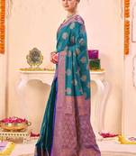 teal ethnic motifs woven design zari saree