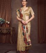 beige woven design tussar saree with unstitched blouse piece