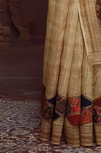 beige woven design tussar saree with unstitched blouse piece