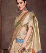 beige bandhani print tussar saree