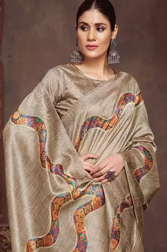 beige embroidered tussar saree
