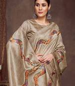 beige embroidered tussar saree