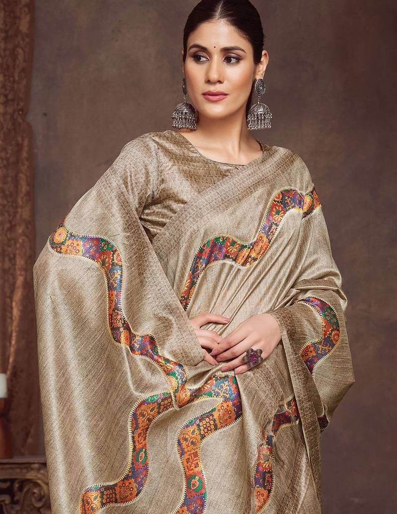 beige embroidered tussar saree