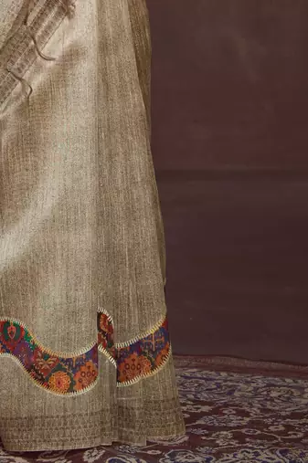 beige embroidered tussar saree