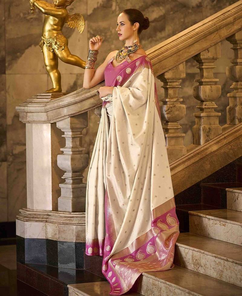 cream ethnic motifs woven design saree