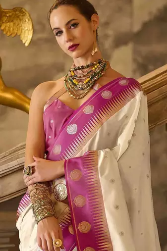 cream ethnic motifs woven design saree
