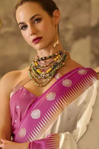 cream ethnic motifs woven design saree