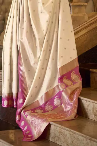 cream ethnic motifs woven design saree