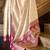 cream ethnic motifs woven design saree