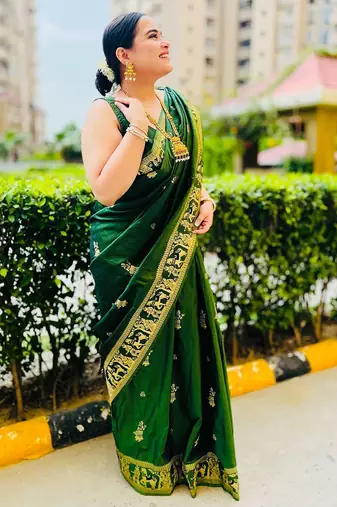 green ethnic motif zari woven banarasi saree
