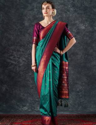 teal woven design zari silk blend banarasi saree 1