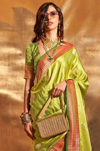 green woven design zari satin banarasi saree