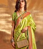 green woven design zari satin banarasi saree