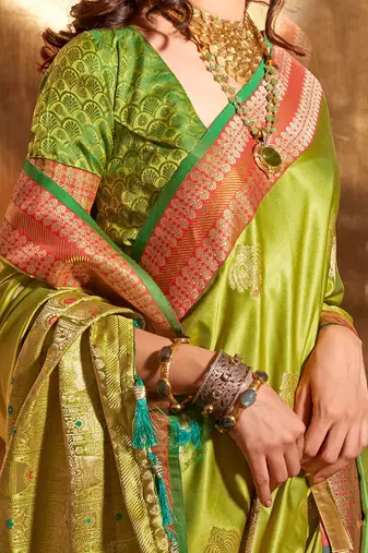 green woven design zari satin banarasi saree