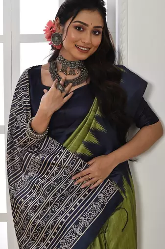 green ethnic motifs woven design tussar saree