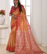 orange geometric printed tussar silk sarees with tassels
