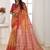 orange geometric printed tussar silk sarees with tassels