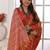 orange geometric printed tussar silk sarees with tassels