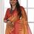 orange geometric printed tussar silk sarees with tassels