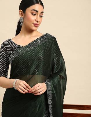 green solid stones-studded organza saree 1