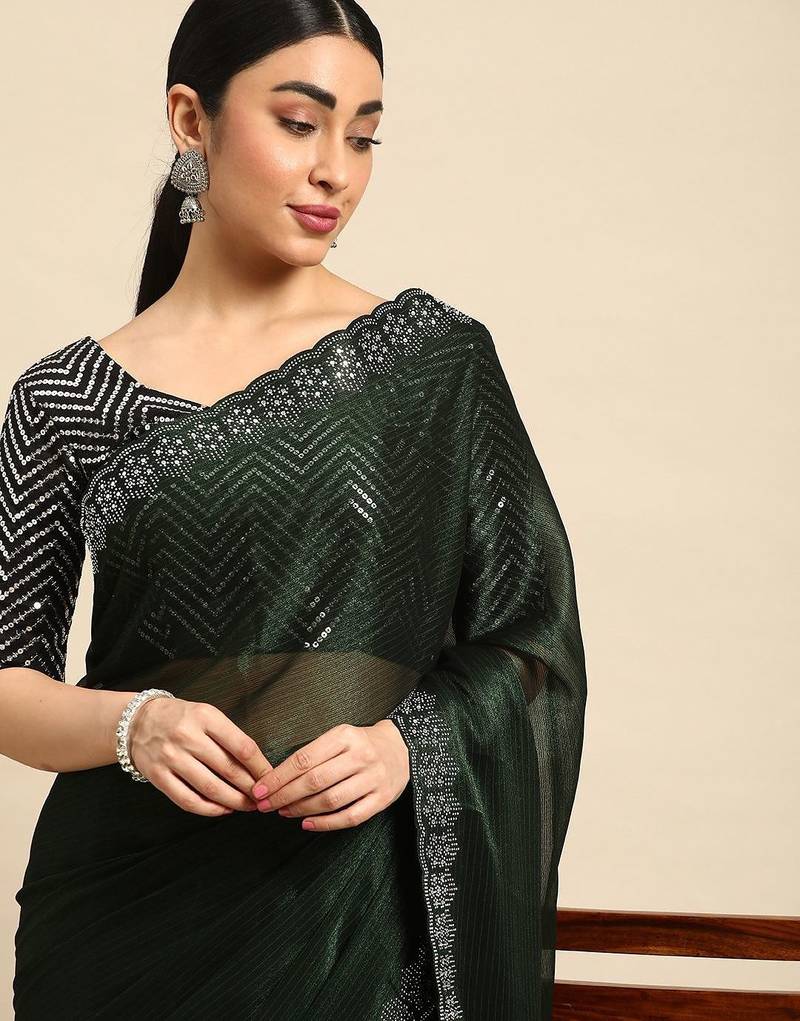 green solid stones-studded organza saree