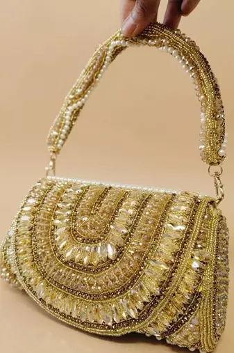Royal regalia embellished potli bag