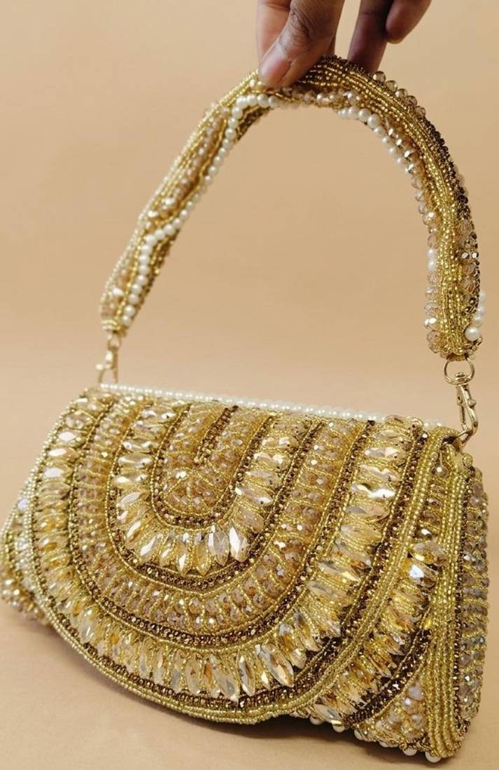 Royal regalia embellished potli bag