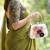 Blossoming grace rose-adorned hard clutch