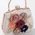 Blossoming grace rose-adorned hard clutch