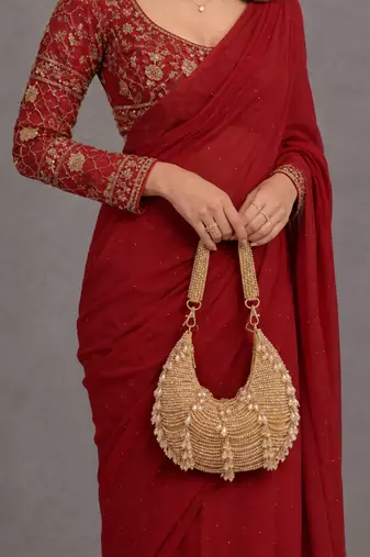 Golden drip crescent beaded shoulder bag