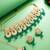 Green kundan choker necklace set with earrings and maangtika