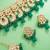 Green kundan choker necklace set with earrings and maangtika