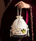 Ivory floral shell embellished potli bag