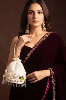 Ivory floral shell embellished potli bag 2
