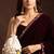 Ivory floral shell embellished potli bag