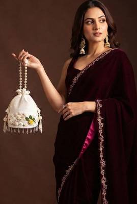 Ivory floral shell embellished potli bag 3