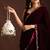 Ivory floral shell embellished potli bag