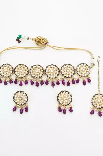 Purple kundan choker necklace set with earrings and maangtika