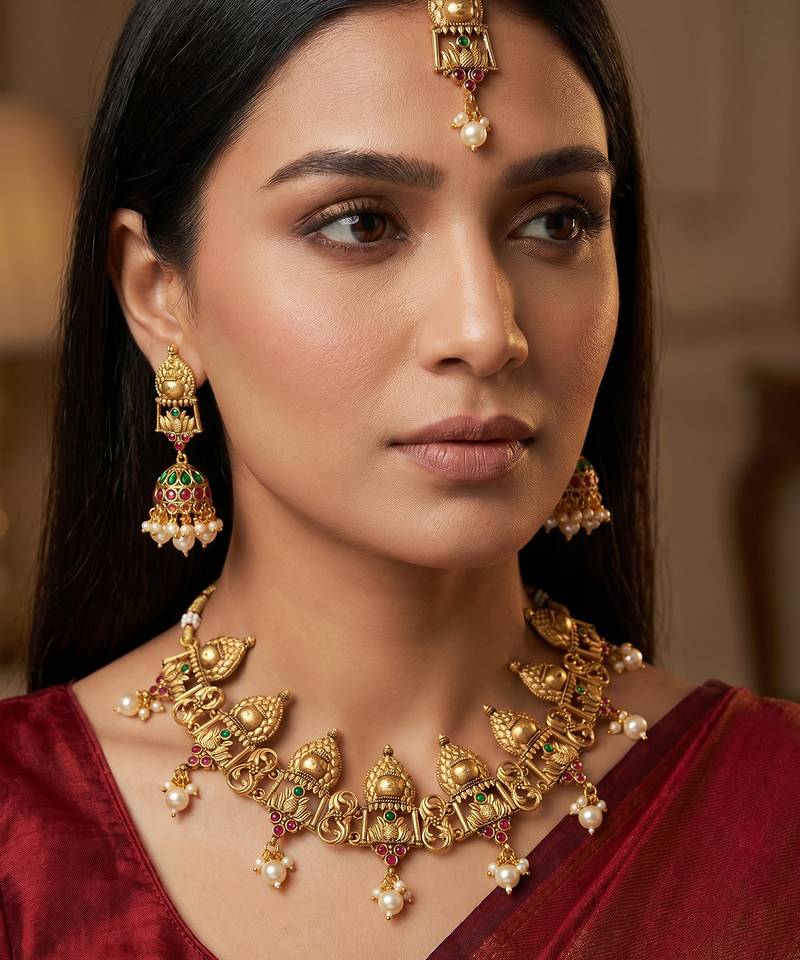 Antique gold temple choker necklace set with jhumka earrings and maangtika