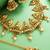 Antique gold temple choker necklace set with jhumka earrings and maangtika