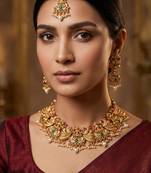 Antique gold lakshmi temple necklace set with earrings and maangtika