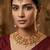 Antique gold lakshmi temple necklace set with earrings and maangtika